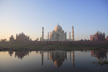 Photo for Reflection of Taj Mahal Seventh Wonders of World in Yamuna river , Agra , Uttar Pradesh , India UNESCO World Heritage Site - Royalty Free Image
