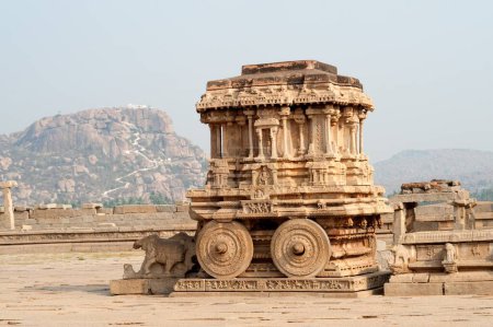 Ornate stone chariot in vitthal temple , Hampi , Karnataka , India