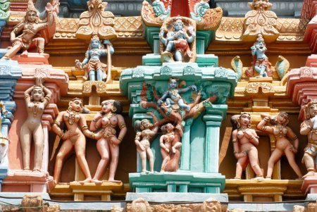 Lord Krishna in various activities carved on Ranga gopuram gateway of gigantic Sri Ranganathswami temple , Srirangam , Tiruchirapalli Trichy , Tamil Nadu , India