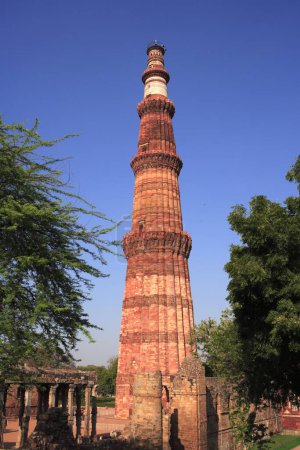 Photo for Qutab Minar built in 1311 red sandstone tower , Indo_Muslim art , Delhi sultanate , Delhi, India UNESCO World Heritage Site - Royalty Free Image