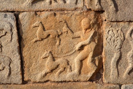 Photo for Statue carved on stone , Great platform , Mahanavami dibba , Hampi , Vijayanagar , UNESCO World Heritage , Deccan plateau , Taluka Hospet , District Bellary , Karnataka , India - Royalty Free Image