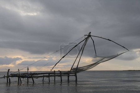 Chinese fishing net at Kochi harbour , Kochi , Kerala , India