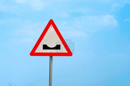 Photo for Road traffic cautionary signs showing dangerous dip , India - Royalty Free Image