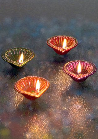 Photo for Decorated and painted in mix color oil lamps used in Diwali deepawali festival - Royalty Free Image