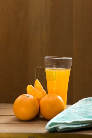 Drink , Two peel orange fruit with juice in bottle and glass