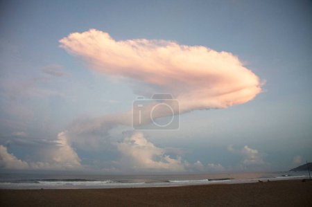 Photo for Orange color sunlight of early morning on cloud in blue sky , Palolem beach , Goa , India - Royalty Free Image