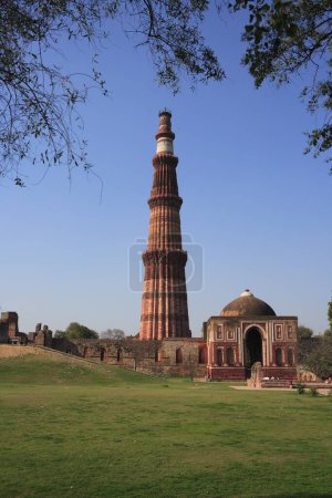 Photo for Qutab Minar and Alai Darwaza built in 1311 red sandstone tower , Indo_Muslim art , Delhi sultanate , Delhi, India UNESCO World Heritage Site - Royalty Free Image