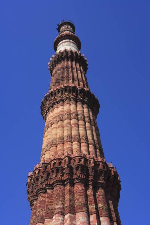 Photo for Qutab Minar built in 1311 red sandstone tower , Delhi , India UNESCO World Heritage Site - Royalty Free Image