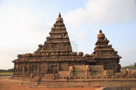 Photo for Shore temple dedicated to gods Vishnu and Shiva built c. 700 _ 728 , Mahabalipuram, District Chengalpattu , Tamil Nadu , India UNESCO World Heritage Site - Royalty Free Image