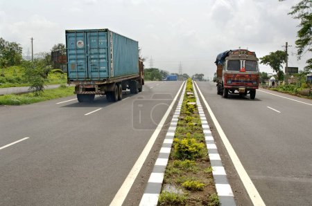 Photo for Trucks on roadway panvel to pune, Maharashtra, India - Royalty Free Image