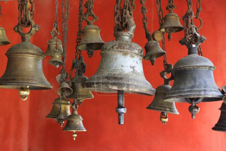 Photo for Metal bells offered by devotees at shiva dole temple, Sivsagar, Assam, India - Royalty Free Image