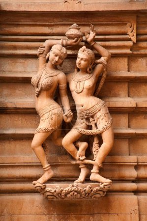 Photo for Sculpture of a man and woman on the wall of panchasara parasvanath jain temple , Patan , Gujarat , India - Royalty Free Image