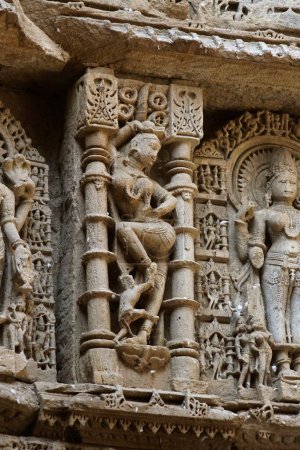 Photo for Vishkanya ; Rani ki vav ; step well ; stone carving ; Patan ; Gujarat ; India - Royalty Free Image