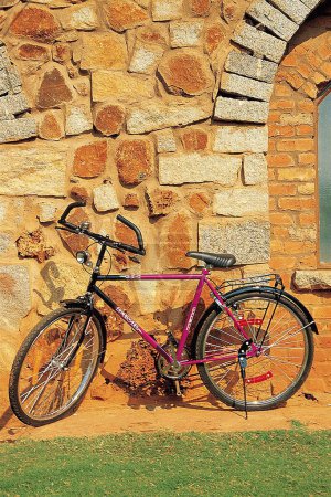 Photo for Bicycle at stone wall ; Lausanne; Switzerland - Royalty Free Image
