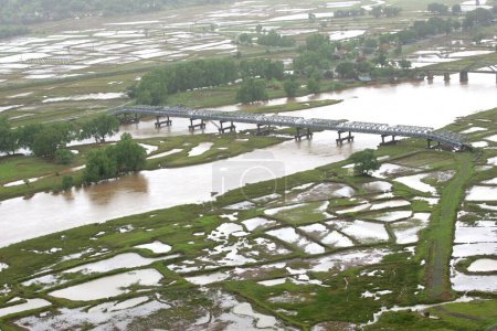 An aerial view of farming land immersed in water flood rocked in Raigad, Maharashtra, India On July 26th 2005 