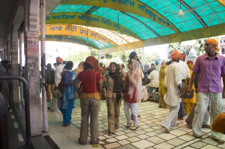 Photo for Sikh Devotees outside Swarn Mandir Golden temple, Amritsar, Punjab, India - Royalty Free Image