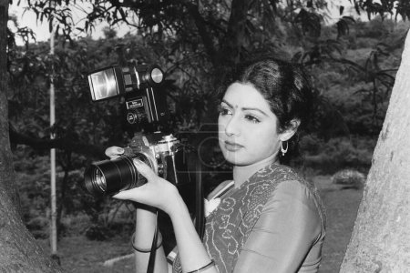 Photo for Indian old vintage 1980s black and white bollywood cinema hindi movie film actor, India, Shree Amma Yanger Ayyappan, Sridevi, Indian actress - Royalty Free Image