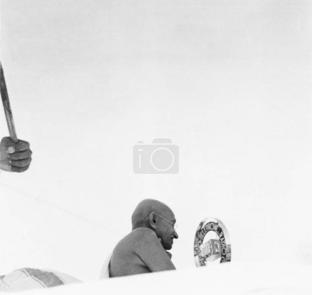 Photo for Mahatma Gandhi speaking into a mike during the congress meeting at Ramgarh, 1939, India - Royalty Free Image