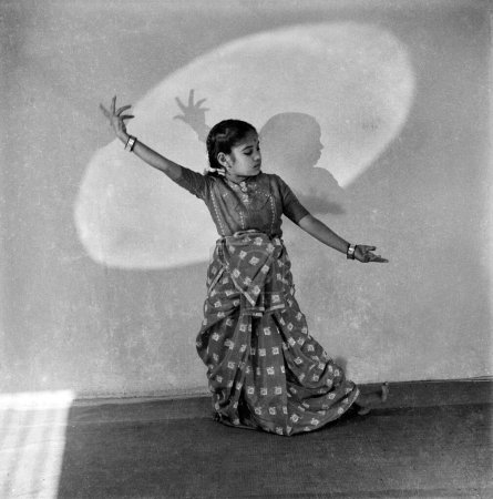 Photo for Old vintage black and white 1900s picture of Indian girl dancing studio portrait India 1940s - Royalty Free Image