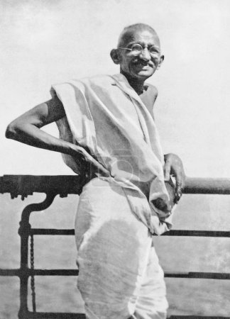 Photo for Mahatma Gandhi during the voyage to England on SS Rajputana, September 1931 - Royalty Free Image