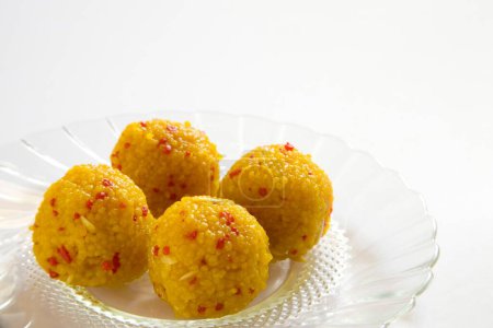 Photo for Indian sweet food Bonbon Confectionery Motichur or Boondi Laddos served in plate - Royalty Free Image