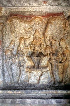 Gaja lakshmi on lotus and bathed by elephants in varaha in varaha cave in Mahabalipuram Mamallapuram , Tamil Nadu , India