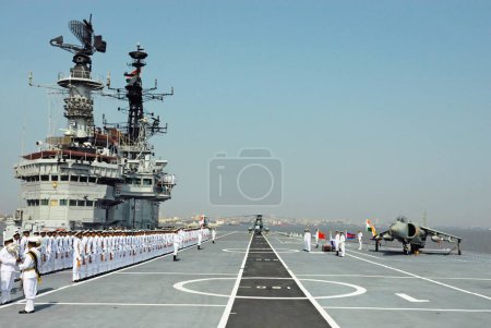 Photo for Indian navy sailors ready for guard of honour on the deck of aircraft carrier INS viraat R22, Bombay, Mumbai, Maharashtra, India - Royalty Free Image