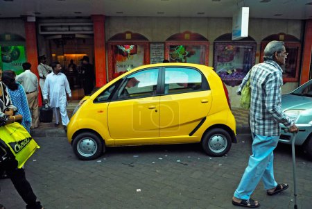 Photo for Tata nano car parked on the street, Bombay, Mumbai, Maharashtra, India - Royalty Free Image