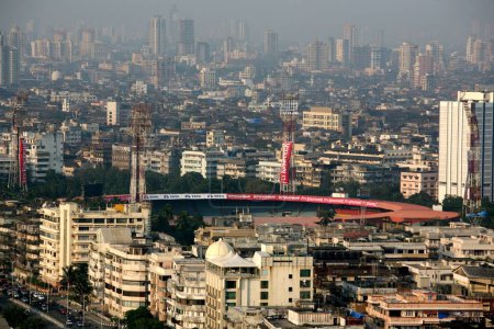 Photo for Aerial view of Wankhede stadium amidst art deco buildings of Bombay Mumbai, Maharashtra, India - Royalty Free Image