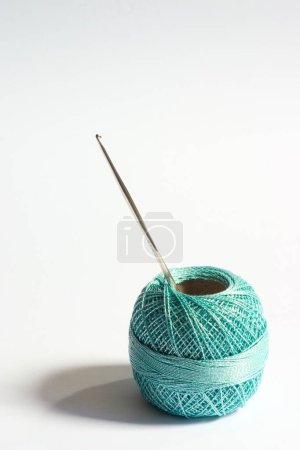 Photo for Concept , alone circle one separate single sole round shape crochet cotton thread with knitting hooked needle on white background - Royalty Free Image