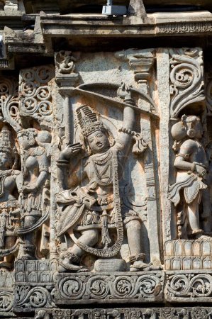 Arjun with bow and arrow carved on hoysaleswara temple ; Halebid Halebidu ; Hassan ; Karnataka ; India
