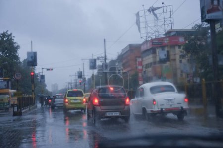 Photo for Vehicles on street monsoon Kolkata India Asia - Royalty Free Image