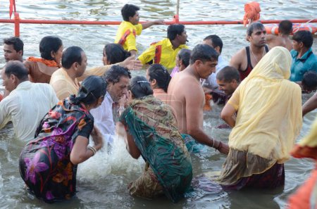 Photo for Pilgrims taking holy dip in river, kumbh mela, ujjain, madhya pradesh, India, Asia - Royalty Free Image