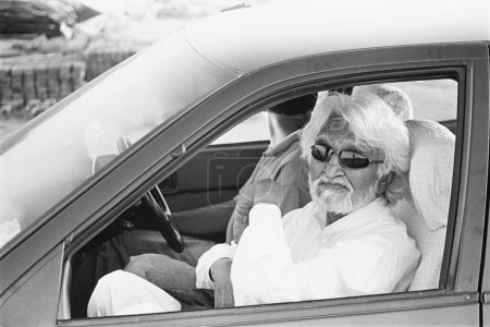 Photo for M F Hussain in car outside the time of india building mumbai Maharashtra India Asia - Royalty Free Image