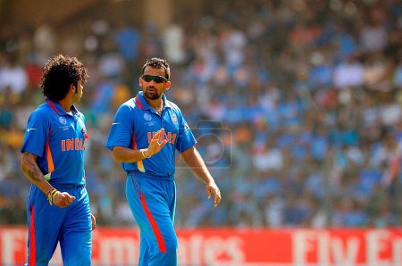Photo for Indian bowlers L S Sreesanth Zaheer Khan during the ICC Cricket World Cup finals against Sri Lanka played at the Wankhede stadium in Mumbai India on April 02 2011 - Royalty Free Image