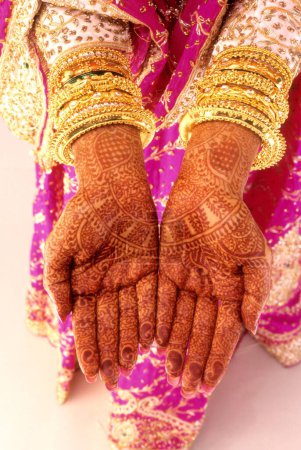 Photo for Indian Muslim bride showing traditional wedding mehandi hands gold jewellery India MR#144 - Royalty Free Image
