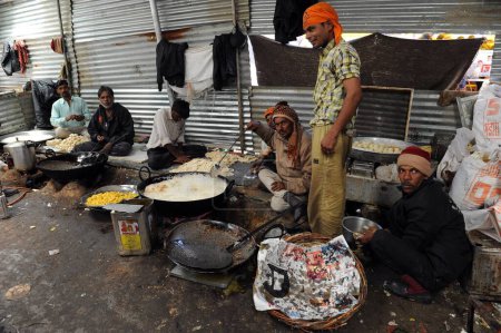 Photo for Man frying, shree shiv sewak delhi bhandara, Jammu Kashmir, India, Asia - Royalty Free Image
