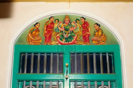 Photo for Laxmi and ladies painting on door , Nattukkottai Chettiars homes Chettinad , Tamil Nadu , India - Royalty Free Image