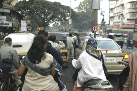 Photo for Women riding on scooters; motor cycles; Pune; Maharashtra; India - Royalty Free Image