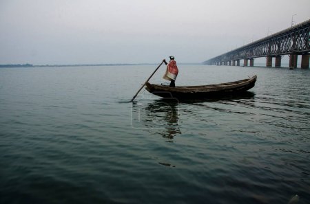 Photo for Fisherman in boat, rajahmundry, andhra pradesh, india, asia - Royalty Free Image