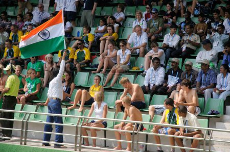 Photo for Indian flag waved by man in stadium of shree shiv chhatrapati sports complex balewadi, Pune, Maharashtra, India 18-October-2008 - Royalty Free Image