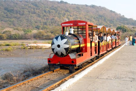 Photo for Mini train to carry passengers to Elephanta cave from Jetty ; Bombay now Mumbai ; Maharashtra ; India - Royalty Free Image