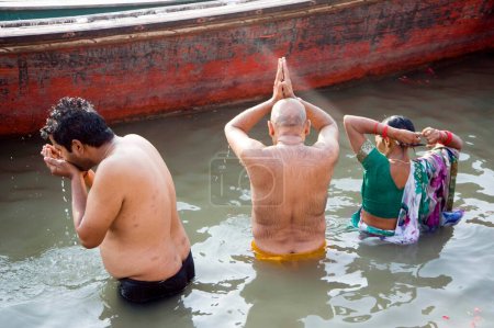 Photo for Pilgrims bathing at ganga ghat varanasi uttar pradesh India Asia - Royalty Free Image