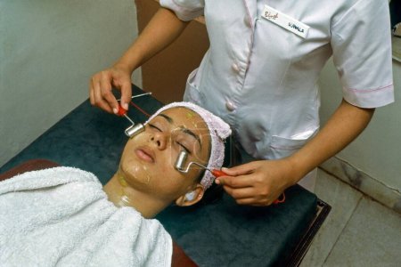 Photo for Priyanka Chopra, Bollywood actress having facial treatment, Mumbai, Maharashtra, India, Asia - Royalty Free Image