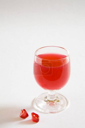 Drinks , Pomegranate seeds Anardana with glass of pulp good for health