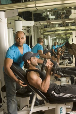 Photo for Bollywood Hindi film actor Hrithik Roshan with gym trainer Satya - Royalty Free Image