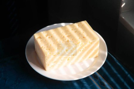 bloque de queso cheddar, india, asia