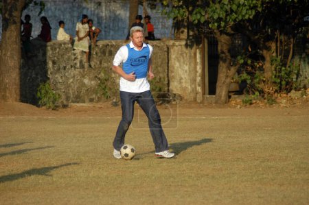 Photo for Boris Franz Becker visits a football program organized by an NGO Magic Bus in Bombay now Mumbai, Maharashtra, India - Royalty Free Image