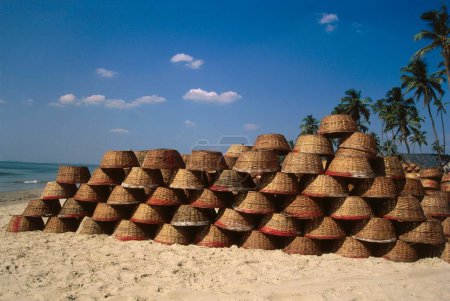 Photo for Row of fishermans round buckets at colva beach, kerala, india - Royalty Free Image