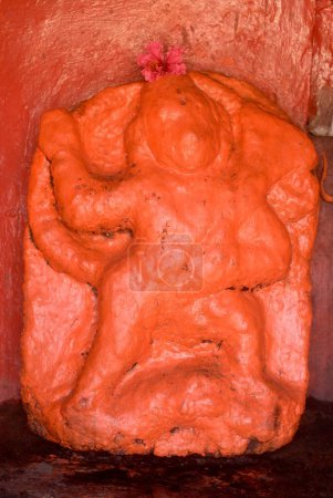 Scarlet idol of lord hanuman maruti in sinhagarh or sinhagad fort , Pune , Maharashtra , India